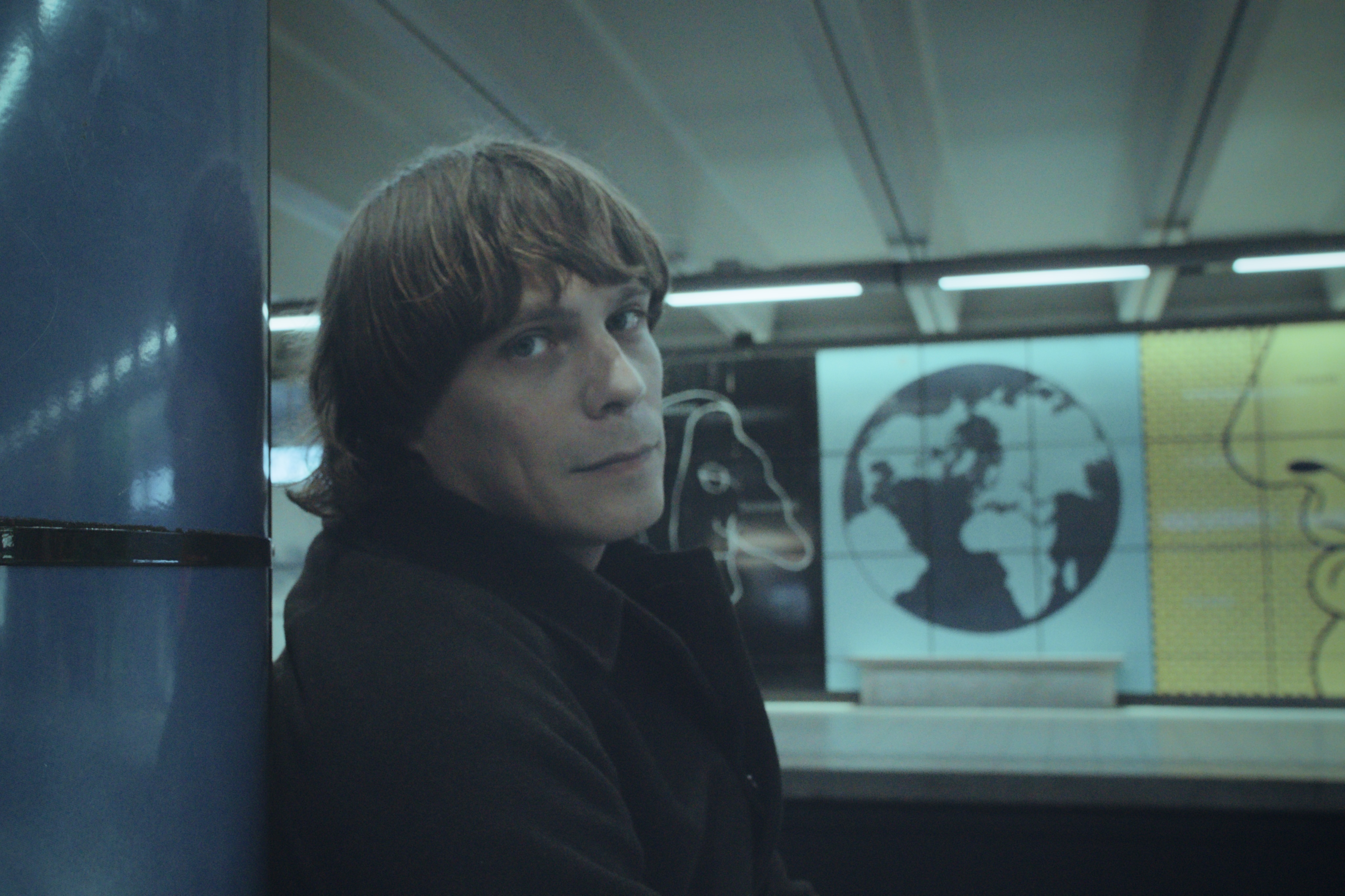 World Brain’s Lucas Chantre in a tiled interior, photographed by Eva L’Hoest